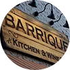 Circular sign detail reading 'Barrique Kitchen & Wine'.