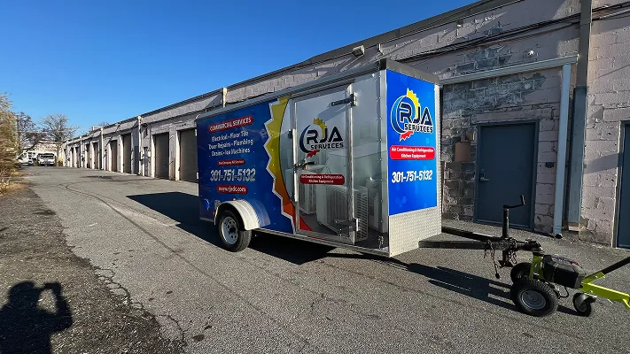 Vehicle wrap for RJA Services, photo 1.