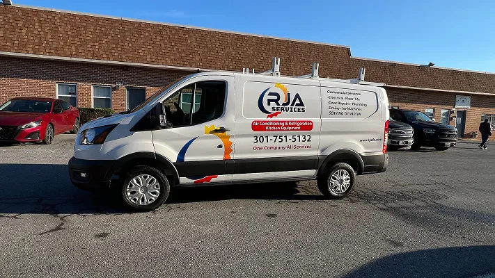 Vehicle wrap for RJA Services, photo 12.
