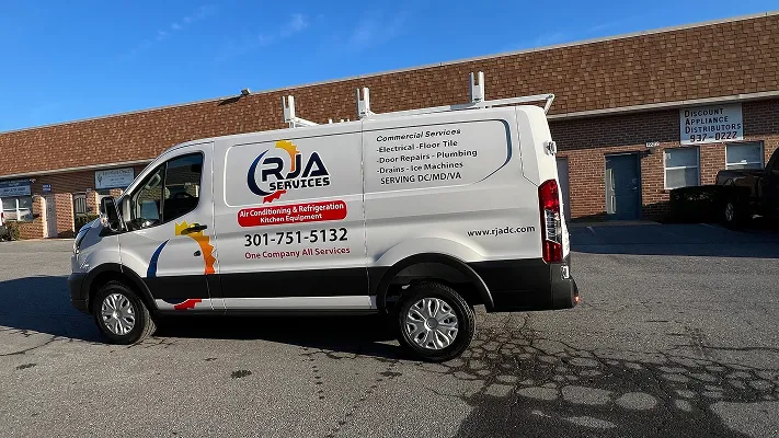 Vehicle wrap for RJA Services, photo 13.